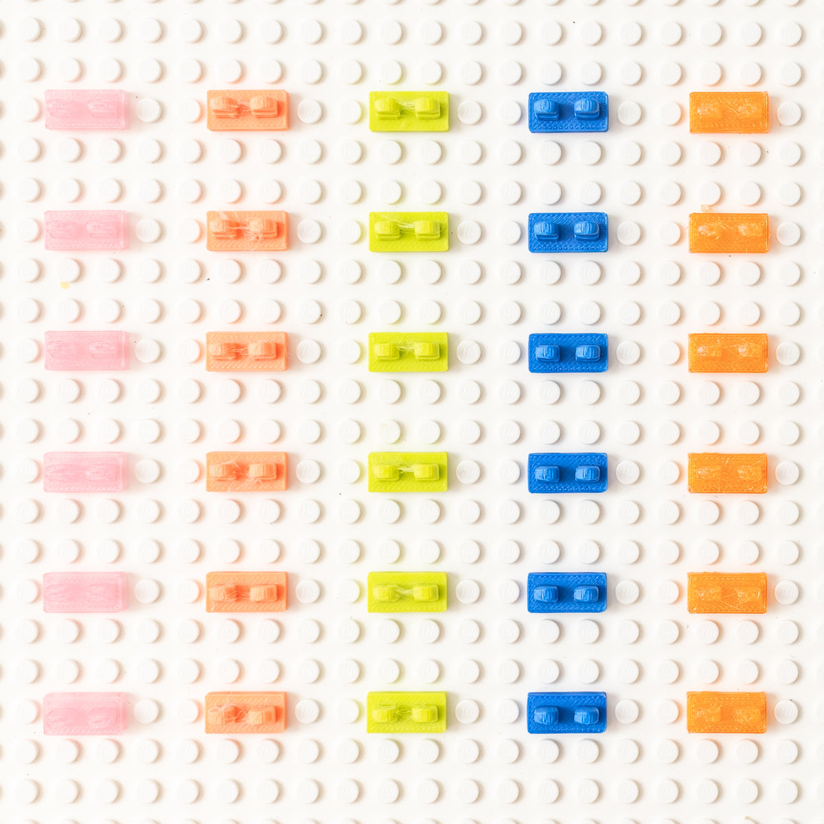 Underside view of 3D-printed heel savers in five colors