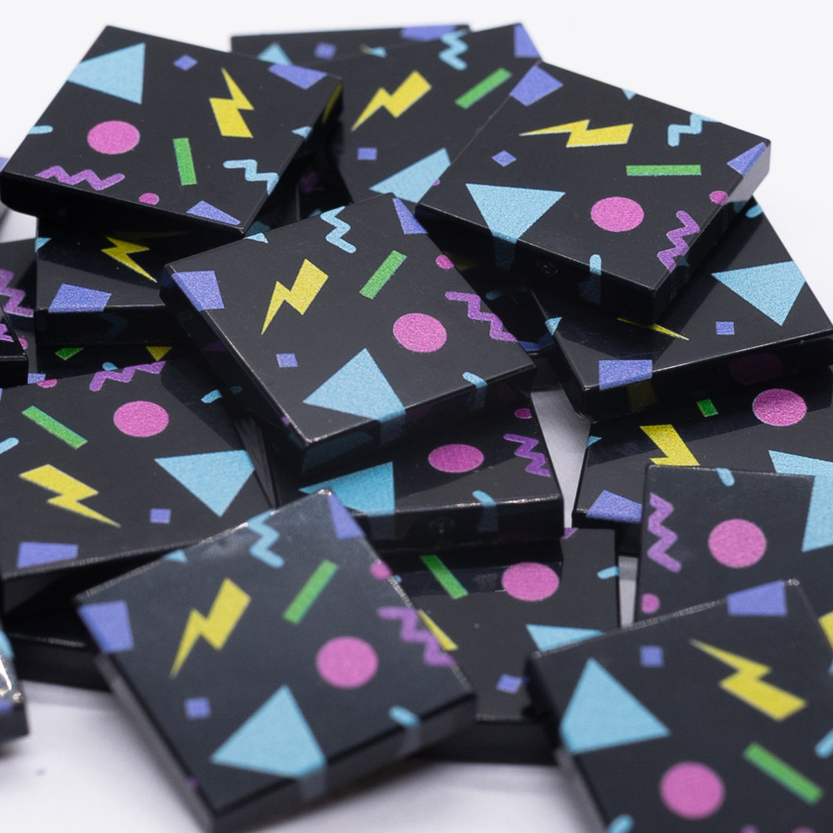 Close-up of EJA Bricks Arcade Tiles with colorful retro geometric print