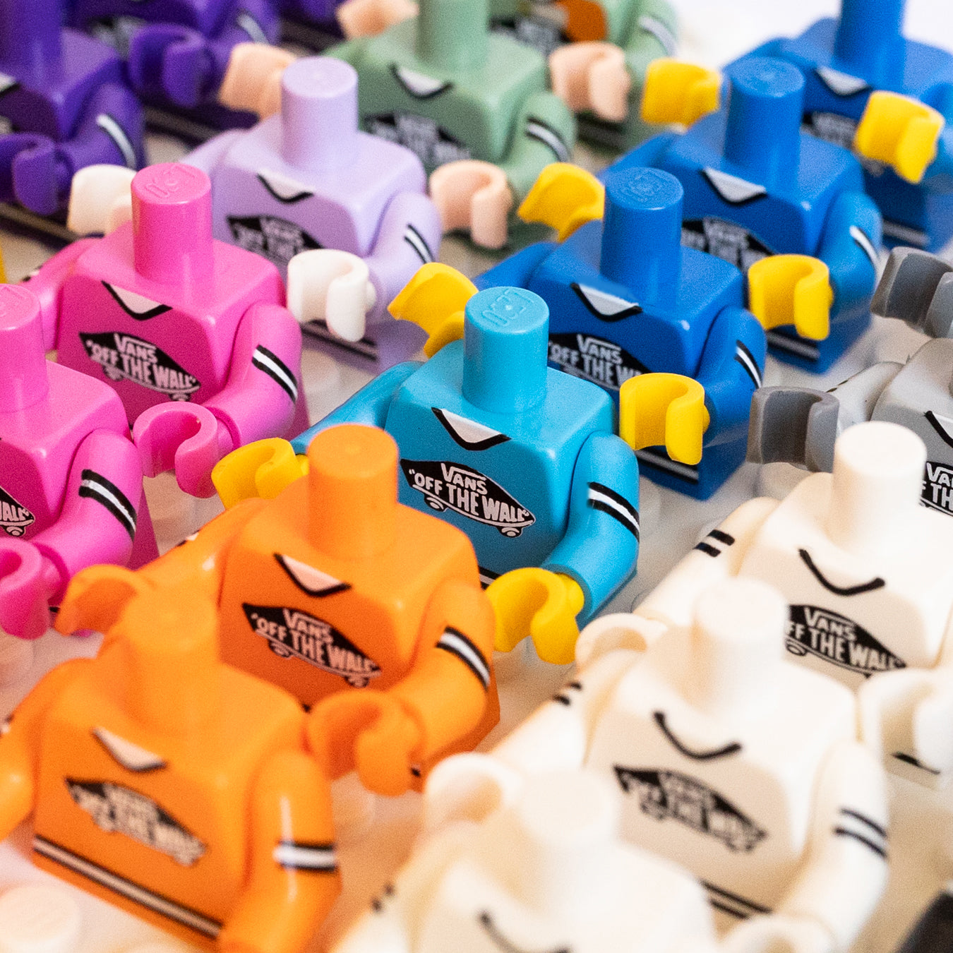Colorful custom Vans logo minifigure torsos close-up